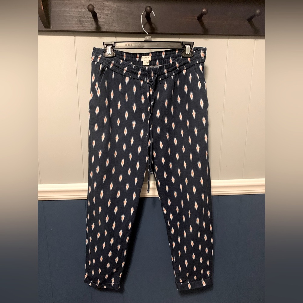 J.Crew ankle cropped blue linen pants with an elastic waist and drawstring.